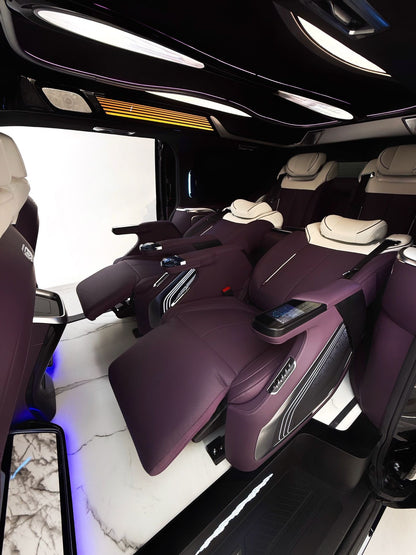 Toyota Sienna interior customization featuring luxury seats, overhead lighting, curtains, flooring, folding tables, and more.