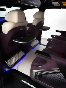 Toyota Sienna interior customization featuring luxury seats, overhead lighting, curtains, flooring, folding tables, and more.