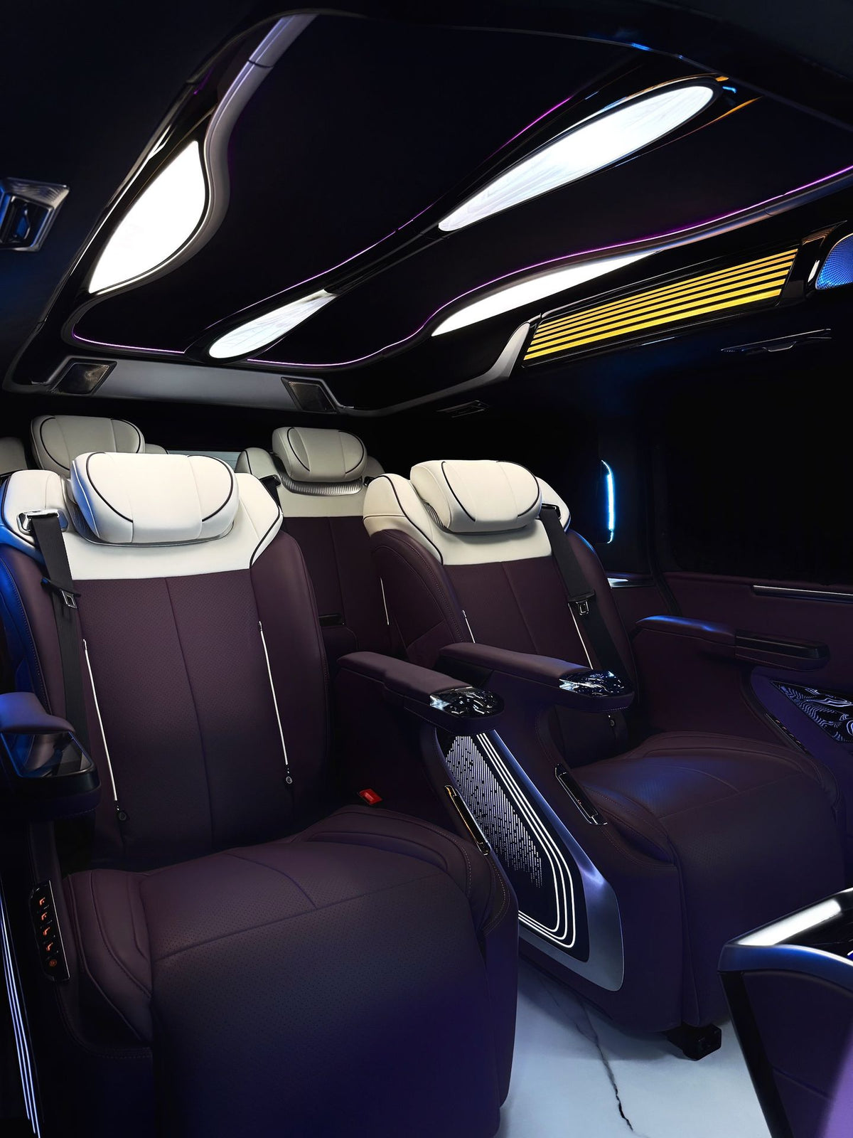 Toyota Sienna interior customization featuring luxury seats, overhead lighting, curtains, flooring, folding tables, and more.