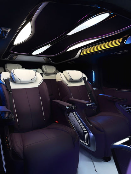 Toyota Sienna interior customization featuring luxury seats, overhead lighting, curtains, flooring, folding tables, and more.