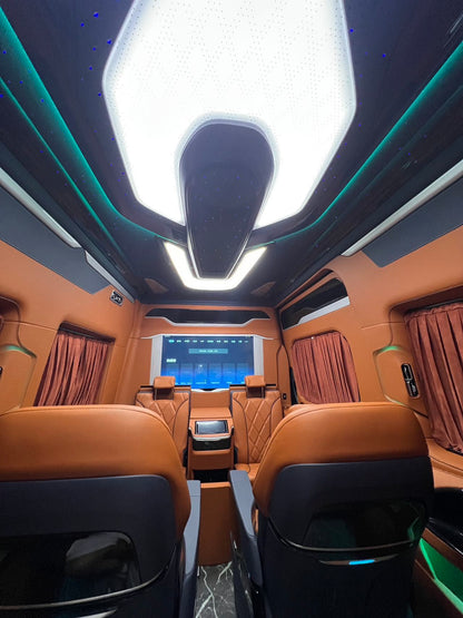Toyota HiAce upgrade package: luxury seating, waterproof flooring, electric curtains, and a concealed bar/seating unit.