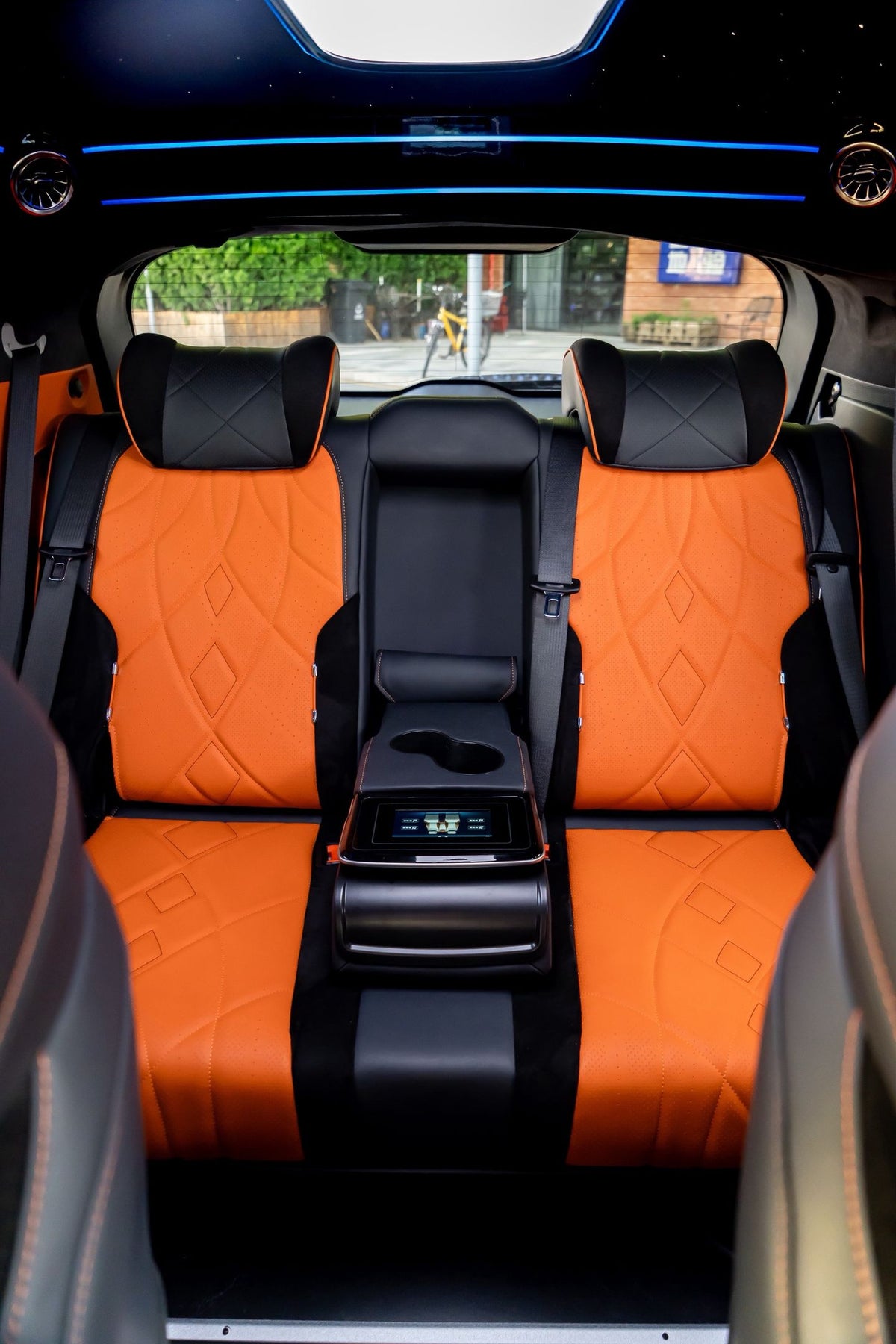 Sienna upgrades: interior and exterior styling, headlights, rear spoiler, luxury seats/bed, and waterproof flooring.