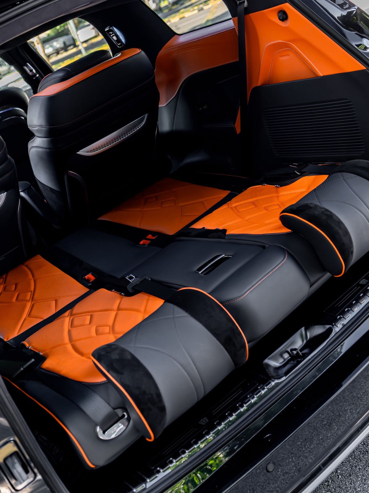 Sienna upgrades: interior and exterior styling, headlights, rear spoiler, luxury seats/bed, and waterproof flooring.