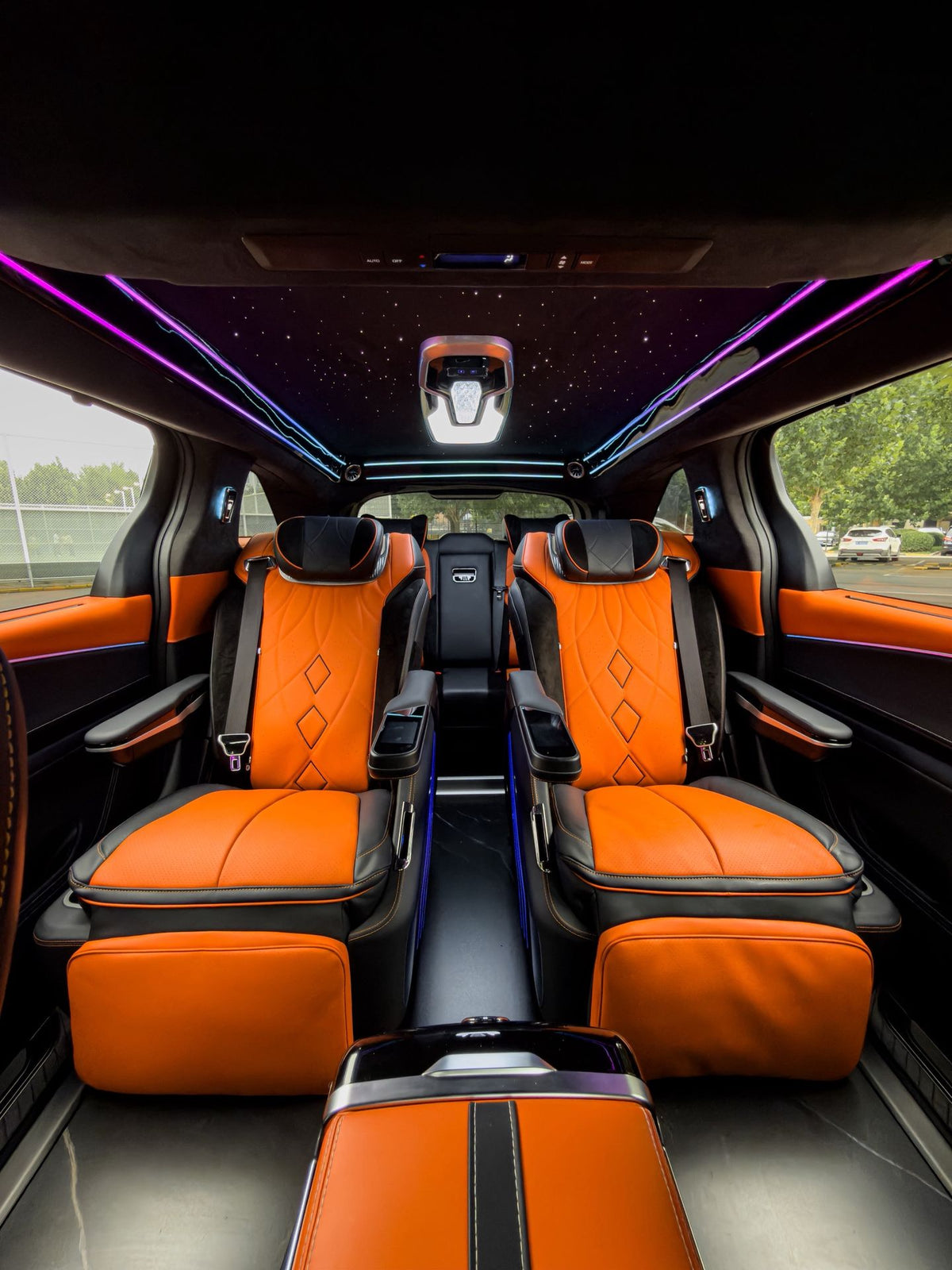 Sienna upgrades: interior and exterior styling, headlights, rear spoiler, luxury seats/bed, and waterproof flooring.